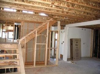 Open framing, stairs and ceiling joists during a remodel